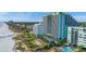 Aerial view of resort, showcasing beach access, pool, landscaping and proximity to the ocean at 6804 N Ocean Blvd. # 1639, Myrtle Beach, SC 29572