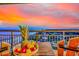 Enjoy ocean views and a colorful sunset from this beautifully furnished balcony and its dining area at 6804 N Ocean Blvd. # 1639, Myrtle Beach, SC 29572