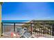 Relax on this balcony and enjoy stunning ocean views from comfortable seating with red and white cushions at 6804 N Ocean Blvd. # 1639, Myrtle Beach, SC 29572