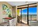 Balcony view featuring ocean scenery, outdoor seating, and natural light streaming through sliding glass doors at 6804 N Ocean Blvd. # 1639, Myrtle Beach, SC 29572