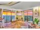 Bright and airy living room with tile floors, large windows and sliders to a balcony, with incredible ocean views at 6804 N Ocean Blvd. # 1639, Myrtle Beach, SC 29572