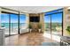 Large, bright living room featuring ocean views from large windows and sliders that lead to the balcony at 6804 N Ocean Blvd. # 1639, Myrtle Beach, SC 29572