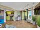 Living room and Kitchen featuring stainless steel appliances and balcony access at 6804 N Ocean Blvd. # 1639, Myrtle Beach, SC 29572