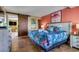 Comfortable main bedroom with colorful bedding, modern furnishings and decorative sliding barn door at 6804 N Ocean Blvd. # 1639, Myrtle Beach, SC 29572