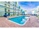 Inviting pool area featuring lounge chairs and a brick deck, ideal for sunbathing and enjoying leisurely afternoons at 6804 N Ocean Blvd. # 1639, Myrtle Beach, SC 29572