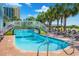 Gorgeous resort pool with lounge chairs, bridge, offering the perfect oasis for relaxation and recreation at 6804 N Ocean Blvd. # 1639, Myrtle Beach, SC 29572
