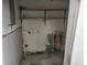 Unfinished basement with shelving needs repair and renovation for a modernized storage or living space at 7 Century St. # 7, Myrtle Beach, SC 29577