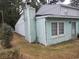 View of the side exterior featuring muted green siding and showing the length of the home at 7 Century St. # 7, Myrtle Beach, SC 29577