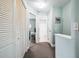Upstairs hallway features lots of closet space and access to the bathroom and an extra room at 705 Beach Walk Pl. # 705, Myrtle Beach, SC 29577