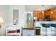 Hallway view leading to the open kitchen and living spaces, with tile flooring throughout at 705 Beach Walk Pl. # 705, Myrtle Beach, SC 29577