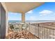 Inviting balcony with table, chairs, and scenic beach vistas at 707 S Ocean Blvd. # 304, North Myrtle Beach, SC 29582