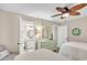 Bright bedroom with attached bathroom, vanity, and mirrored closet at 707 S Ocean Blvd. # 304, North Myrtle Beach, SC 29582