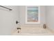 Relaxing bathtub with calming artwork and elegant fixtures at 707 S Ocean Blvd. # 304, North Myrtle Beach, SC 29582