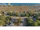 Scenic aerial view showcasing the coastal neighborhood with a marsh and waterway backdrop at 728 Elizabeth Dr., Murrells Inlet, SC 29576