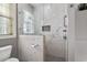 Tiled shower features frameless glass door and tiled niche at 728 Elizabeth Dr., Murrells Inlet, SC 29576