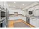 Well-equipped kitchen with stainless steel appliances, granite countertops, and hardwood floors at 7809 Monarch Dr., Myrtle Beach, SC 29572