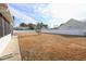 Expansive backyard with a white fence and minimal landscaping at 793 Drawbridge Dr., Conway, SC 29526