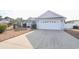 Charming single-story home featuring a two-car garage and well-maintained landscaping at 793 Drawbridge Dr., Conway, SC 29526