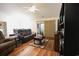 Inviting living room boasts hardwood floors, a fireplace, and plenty of room for entertaining at 793 Drawbridge Dr., Conway, SC 29526