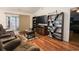 Inviting living room boasts hardwood floors, a fireplace, and plenty of room for entertaining at 793 Drawbridge Dr., Conway, SC 29526