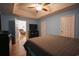 Comfortable main bedroom features a ceiling fan, neutral walls, and a spacious layout at 793 Drawbridge Dr., Conway, SC 29526