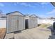 Two large plastic storage sheds in fenced back yard at 793 Drawbridge Dr., Conway, SC 29526