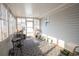 Sunroom with light and bright interior and a grey patterned rug at 793 Drawbridge Dr., Conway, SC 29526