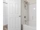 Bathroom showing a white shower-tub and door at 810 Finger Lake Dr., Myrtle Beach, SC 29588