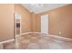 Bedroom with tile floors, large windows, ceiling fan, and a view into another room at 810 Finger Lake Dr., Myrtle Beach, SC 29588