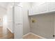 Laundry room featuring white cabinets and tiled flooring at 810 Finger Lake Dr., Myrtle Beach, SC 29588