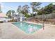 Backyard swimming pool with a concrete deck and a storage shed with decorative details at 810 Finger Lake Dr., Myrtle Beach, SC 29588