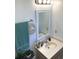 Cozy bathroom with decorative mirror and granite top sink at 820 9Th Ave. S, North Myrtle Beach, SC 29582