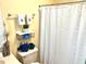 Yellow bathroom with nautical towels, white shower curtain, and unique fish decorations at 820 9Th Ave. S, North Myrtle Beach, SC 29582