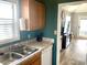 The kitchen features wood cabinets and countertops with an opening view into the living room at 820 9Th Ave. S, North Myrtle Beach, SC 29582