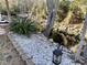 Picturesque landscape featuring a decorative stream, lush greenery, and scenic views at 820 9Th Ave. S, North Myrtle Beach, SC 29582