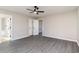 Spacious bedroom featuring gray vinyl flooring and double door closet at 822 Highway 90, Conway, SC 29526