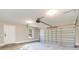 An empty attached garage has a window and an automatic door opener at 822 Highway 90, Conway, SC 29526