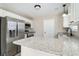 Beautiful kitchen features stainless steel appliances, a granite countertop, and white cabinets at 822 Highway 90, Conway, SC 29526