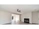 Inviting living room with fireplace, neutral paint, luxury vinyl floors, and view to other rooms at 822 Highway 90, Conway, SC 29526