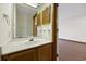 Bathroom features a vanity with a mirror, classic decor and lighting at 830 44Th Ave. N # L2, Myrtle Beach, SC 29577