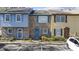 Charming townhomes with colorful exteriors, manicured landscaping, and convenient parking spaces at 830 44Th Ave. N # L2, Myrtle Beach, SC 29577