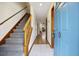 Inviting foyer with stairs leading to the upper level, showcasing tile and hardwood floors at 830 44Th Ave. N # L2, Myrtle Beach, SC 29577