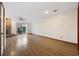 Bright living room featuring hardwood floors, fireplace, and sliding glass doors to the patio at 830 44Th Ave. N # L2, Myrtle Beach, SC 29577