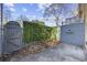 Private patio enclosed with wood fence and greenery for added privacy and curb appeal at 830 44Th Ave. N # L2, Myrtle Beach, SC 29577