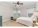 Bright bedroom featuring neutral walls, a ceiling fan, and comfortable seating near sunny windows at 898 Bluffview Dr., Myrtle Beach, SC 29579