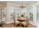 Charming breakfast nook featuring a round wooden table and cozy seating at 898 Bluffview Dr., Myrtle Beach, SC 29579