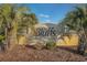 Entrance sign for The Bluffs on the Waterway, beautifully framed by palm trees and landscaping at 898 Bluffview Dr., Myrtle Beach, SC 29579