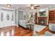 Inviting living room with fireplace, hardwood floors, and ample natural light at 898 Bluffview Dr., Myrtle Beach, SC 29579