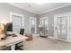 Bright home office space with natural light, a modern desk setup, and minimalist decor at 898 Bluffview Dr., Myrtle Beach, SC 29579