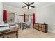 Bright, carpeted office space with a built-in desk and ample natural light at 898 Bluffview Dr., Myrtle Beach, SC 29579
